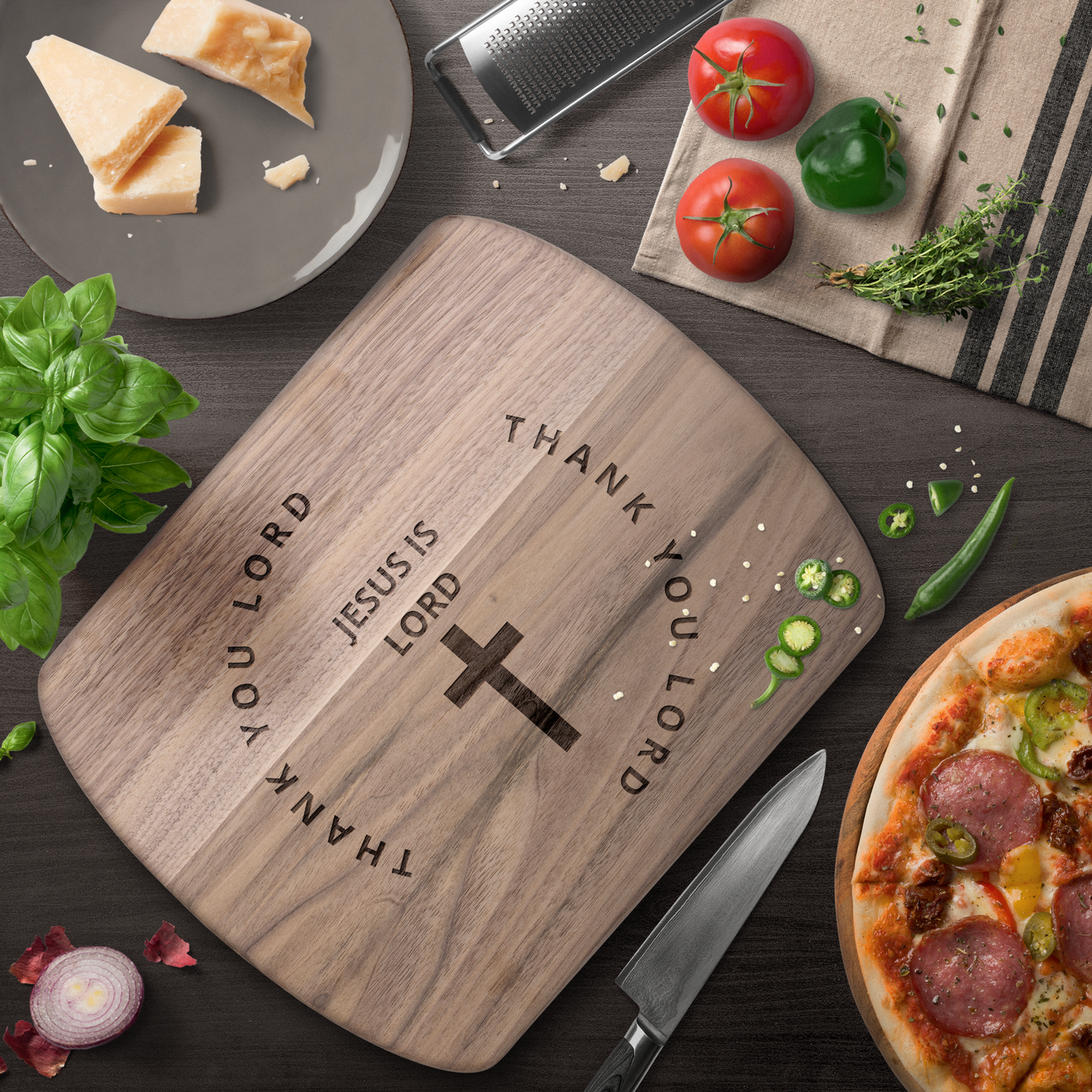 Jesus_Is_Lord-_Cutting_Board_Dark_Rounded_H_Lifestyle_Mockup.png